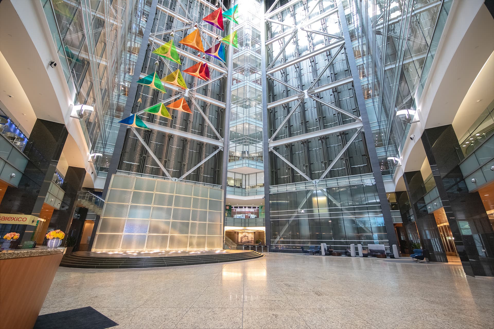 Lobby atrium at One Campus Martius in front of the indoor water feature and elevator shafts.